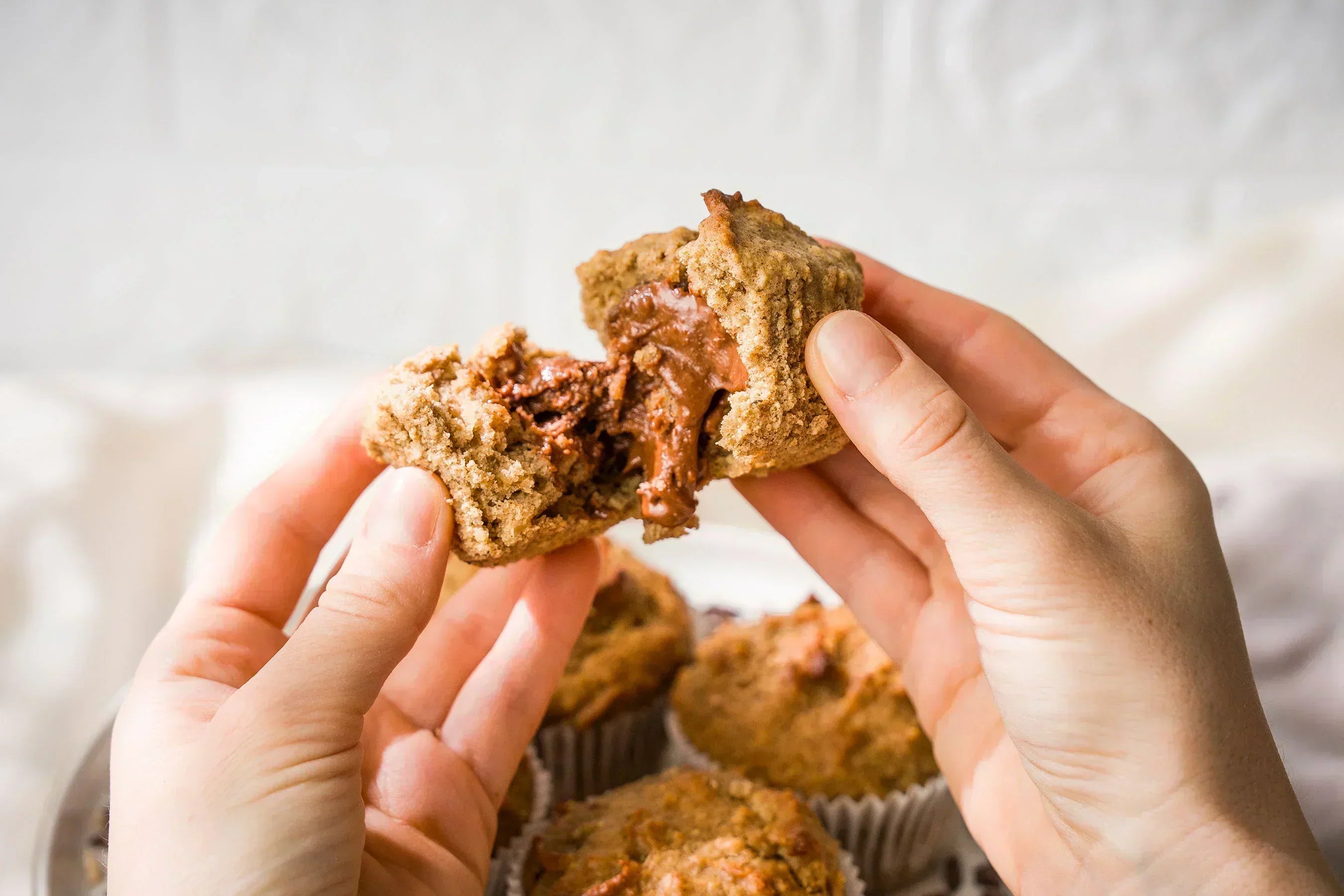 Haselnuss-Muffins mit flüssigem Nougatkern