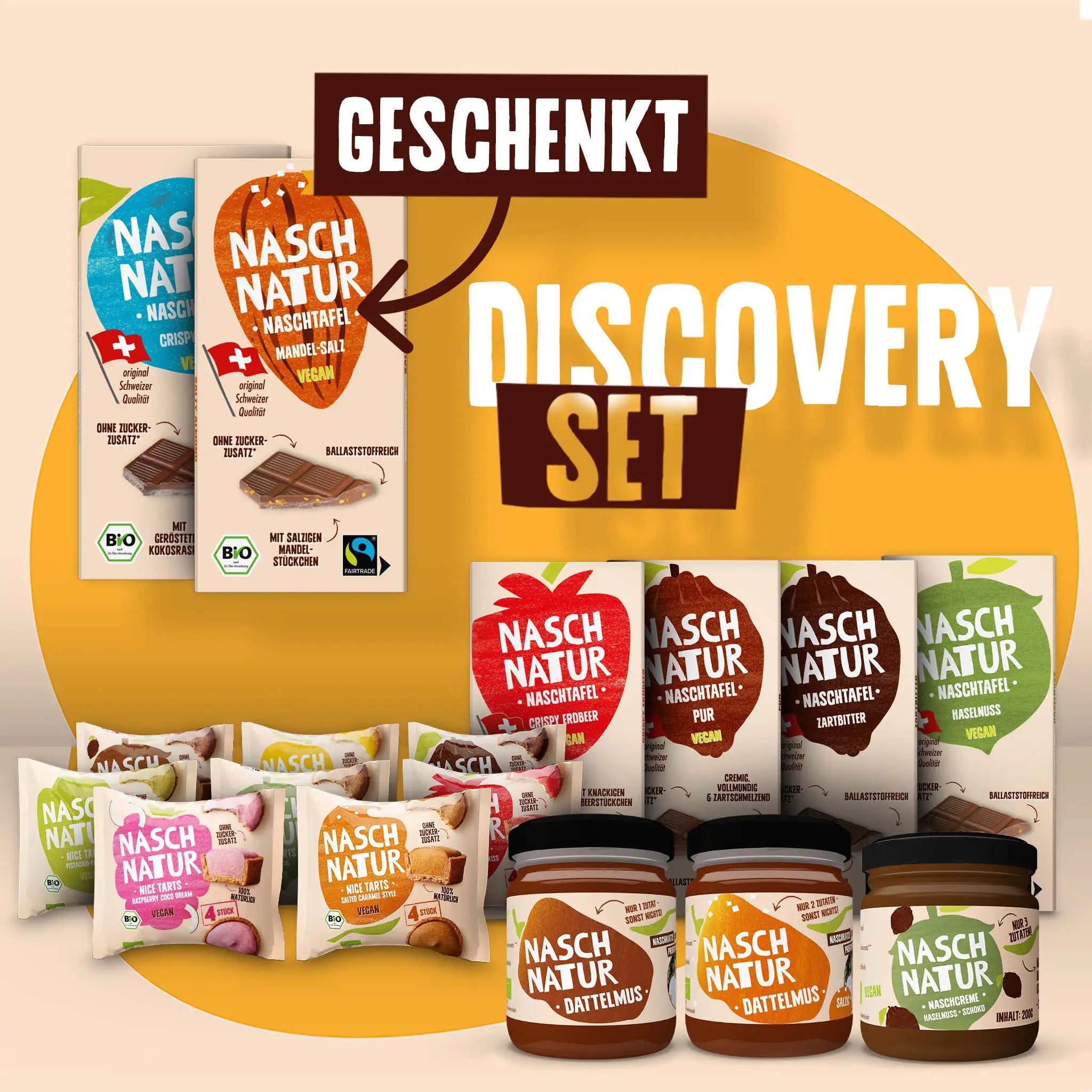 Discovery-Set mit verschiedenen Sorten Schokoladentafeln, einer Packung Dattelmus Pur und einer salzigen Sorte, Nicetarts und zwei Gratis-Tafeln. 